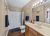 Thumbnail 12 of 36 - Bathroom with large vanity area at Heritage Trail Apartments in Terre Haute, IN.
