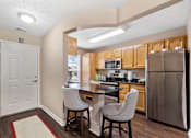 Thumbnail 2 of 36 - Kitchen with island at Heritage Trail Apartments in Terre Haute, IN.