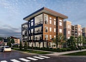 Thumbnail 6 of 8 - A modern apartment building with a car driving on the street in front.