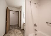 Thumbnail 7 of 18 - tile bathroom with bath tub 