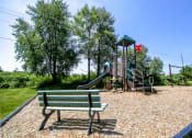 Thumbnail 11 of 18 - Bench and Playground Amenity 