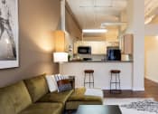 Thumbnail 7 of 22 - Living Room With Kitchen View at Harness Factory Lofts and Apartments, Indiana
