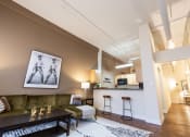 Thumbnail 6 of 22 - Living Room With Kitchen at Harness Factory Lofts and Apartments, Indianapolis