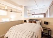 Thumbnail 12 of 22 - Comfortable Bedroom at Harness Factory Lofts and Apartments, Indiana