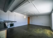 Thumbnail 13 of 23 - Unfurnished Living Room at Janus Lofts, Managed by Buckingham Urban Living, Indiana, 46225