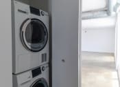 Thumbnail 2 of 23 - In Home Stacked Washer/Dryer at Janus Lofts, Managed by Buckingham Urban Living, Indianapolis, IN, 46225