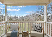 Thumbnail 8 of 21 - A covered balcony at Landmark at Lyncrest Reserve Apartments, Nashville, TN, 37209