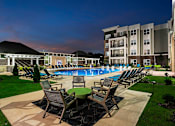 Thumbnail 35 of 36 - Poolside patio seating at Mosaic at Levis Commons, Perrysburg, 43551