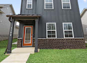 Thumbnail 45 of 45 - Craftsman-style rental home with covered front porch and green siding at Mural Lewis Center