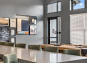 Thumbnail 12 of 20 - Clubhouse at Nook Nine with a billiards table, modern artwork, and a sleek communal table.