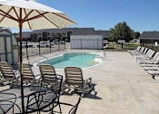 Thumbnail 22 of 23 - Poolside Sundeck With Relaxing Chairs at Bradford Place Apartments, Lafayette, IN