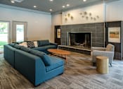 Thumbnail 17 of 38 - Clubhouse With Fireplace at Woodbridge Apartments, Kentucky, 40242