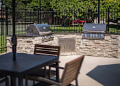 Thumbnail 33 of 38 - Outdoor Grill With Intimate Seating Area at Woodbridge Apartments, Louisville, Kentucky