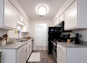 Thumbnail 2 of 68 - Efficient Appliances In Kitchen at Gramercy Apartments, Indiana, 46032