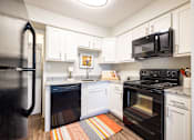 Thumbnail 3 of 68 - Fully Equipped Kitchen Includes Frost-Free Refrigerator, Electric Range, & Dishwasher at Gramercy Apartments, Indiana