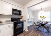 Thumbnail 5 of 68 - Eat-In Kitchen at Gramercy Apartments, Carmel, IN 46032 