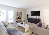 Thumbnail 11 of 68 - Living Room With TV at Gramercy Apartments, Carmel, IN 46032