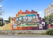 Thumbnail 58 of 68 - a large mural on the side of a building that reads carmel midtown plaza at Gramercy Apartments, Carmel