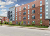 Thumbnail 2 of 34 - the building in which the hotel is located at 310 at Nulu Apartments-Student, Louisville, 40202