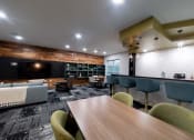 Thumbnail 5 of 34 - a living room and dining room with a table and chairs at 310 at Nulu Apartments-Student, Kentucky