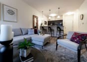 Thumbnail 24 of 34 - a living room with a couch and a table at 310 at Nulu Apartments-Student, Kentucky