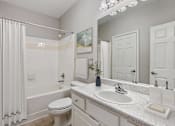 Thumbnail 11 of 33 - A white bathroom at Village at Almand Creek, Georgia 30094