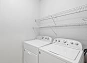 Thumbnail 12 of 33 - In-unit laundry room at Village at Almand Creek, Conyers, GA