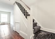 Thumbnail 17 of 18 - a view of the stairs from the front of the house