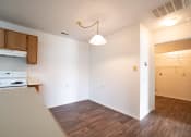Thumbnail 28 of 37 - a kitchen and dining area in a 555 waverly unit