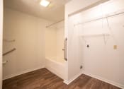 Thumbnail 23 of 37 - a bathroom with a shower and a bathtub