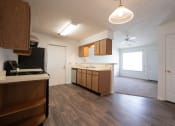 Thumbnail 16 of 37 - a kitchen and living room in a 555 waverly unit
