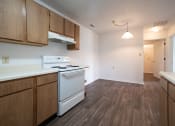 Thumbnail 25 of 37 - a kitchen and dining area in a 555 waverly unit