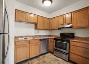 Thumbnail 1 of 25 - Ample cabinet space in the kitchen at Somerset Apartments in Marion, IN.