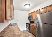 Thumbnail 2 of 25 - Spacious kitchen at Somerset Apartments in Marion, IN.