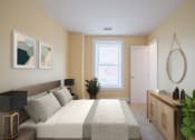 Thumbnail 17 of 28 - Staged bedroom at The Plaza at Library Square Apartments, Indianapolis, Indiana