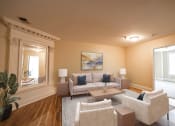 Thumbnail 15 of 28 - Staged living room at The Plaza at Library Square Apartments, 902 N. Pennsylvania Street, Indianapolis