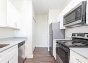 Thumbnail 15 of 28 - Efficient Appliances In Kitchen at Steeplechase at Shiloh Crossing, Avon, IN