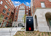 Thumbnail 5 of 58 - A brick building with a sign that says The Beverly.