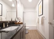 Thumbnail 49 of 53 - a bathroom with a sink and a toilet