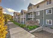 Thumbnail 1 of 21 - Entry with monument sign at VINTAGE AT VANCOUVER, Washington