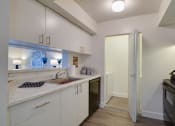 Thumbnail 17 of 23 - Kitchen with appliances at Aqua 2800, Oakland Park, 33309