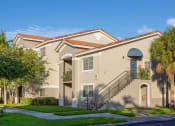Thumbnail 14 of 24 - Exterior building view with grass at Banyan Pointe, Florida