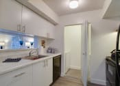 Thumbnail 11 of 23 - Kitchen with appliances at Aqua 2800, Oakland Park, FL 33309