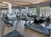 Thumbnail 13 of 24 - Gym with cardio  equipment at Banyan Pointe, Coconut Creek