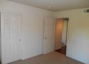 Thumbnail 15 of 21 - Bedroom with carpeting at DOVER WOODS SENIOR APARTMENTS, Fairfield, CA