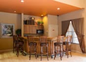 Thumbnail 12 of 24 - Clubhouse seating near kitchen at Banyan Pointe, Coconut Creek, 33073