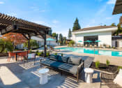 Thumbnail 27 of 38 - Arlo pool area with BBQ and lounge area at THE ARLO, Citrus Heights, California