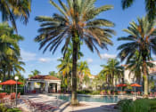 Thumbnail 6 of 24 - Pool with lounge chairs at Banyan Pointe, Coconut Creek, Florida 