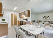 Thumbnail 3 of 28 - Kitchen with appliances and dining at TOWNSHIP SHERWOOD, Sherwood