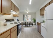 Thumbnail 8 of 28 - refrigerator, stove, dishwasher, plenty of counter space for prep. at TOWNSHIP SHERWOOD, Oregon